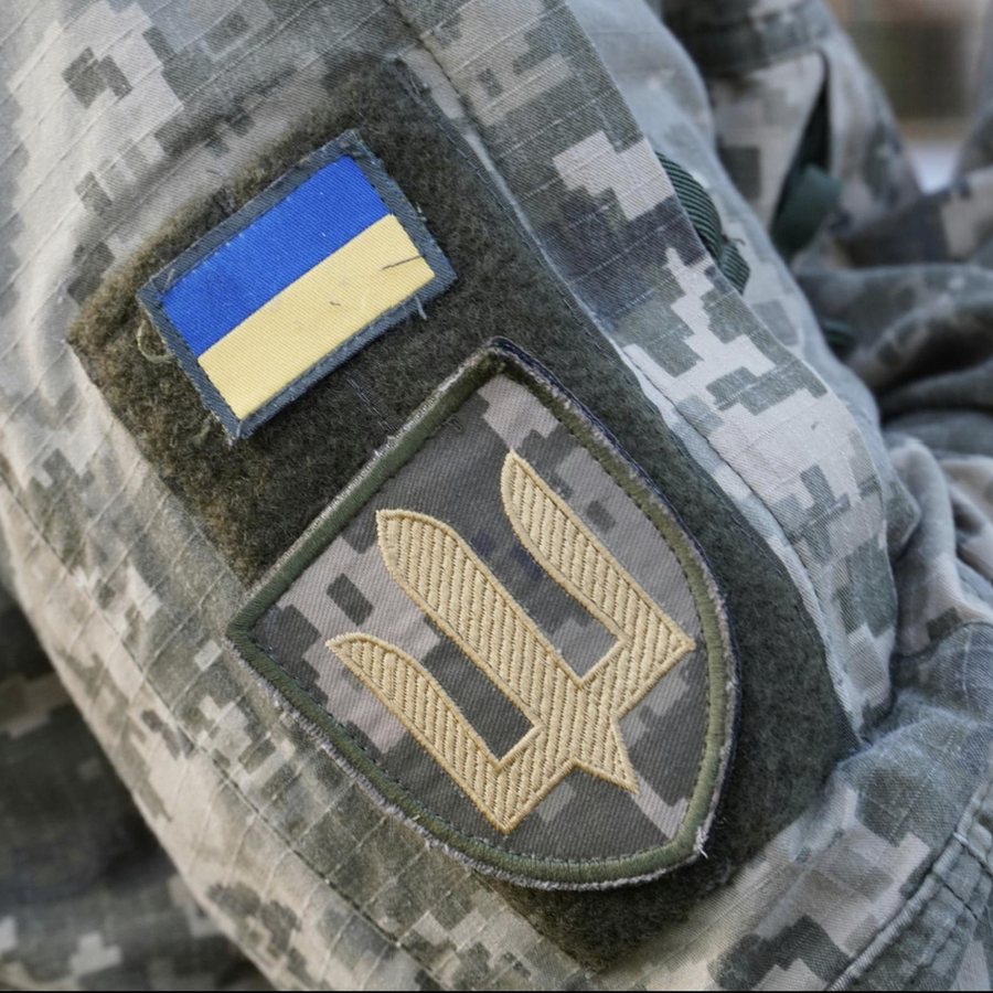 A Ukrainian flag patch on a soldier's sleeve