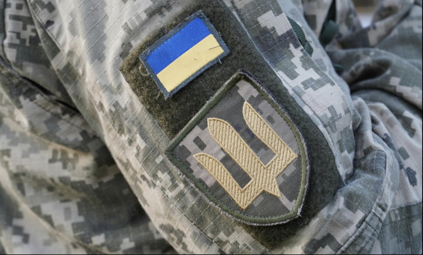 A Ukrainian flag patch on a soldier's sleeve