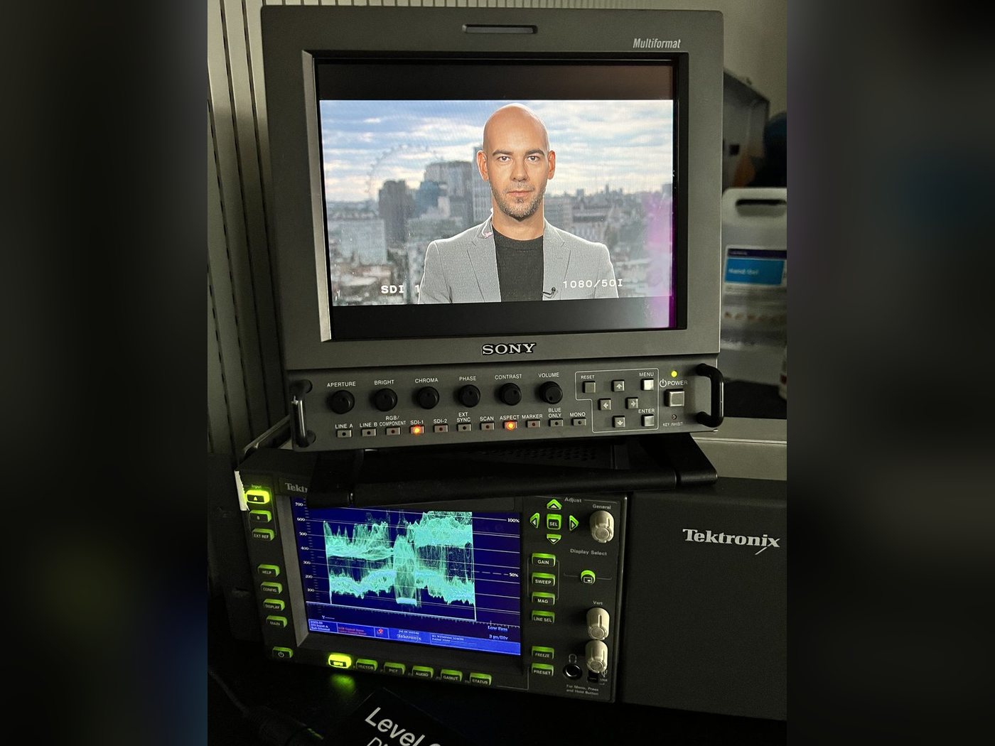 A studio monitor showing Leon Emirali on air