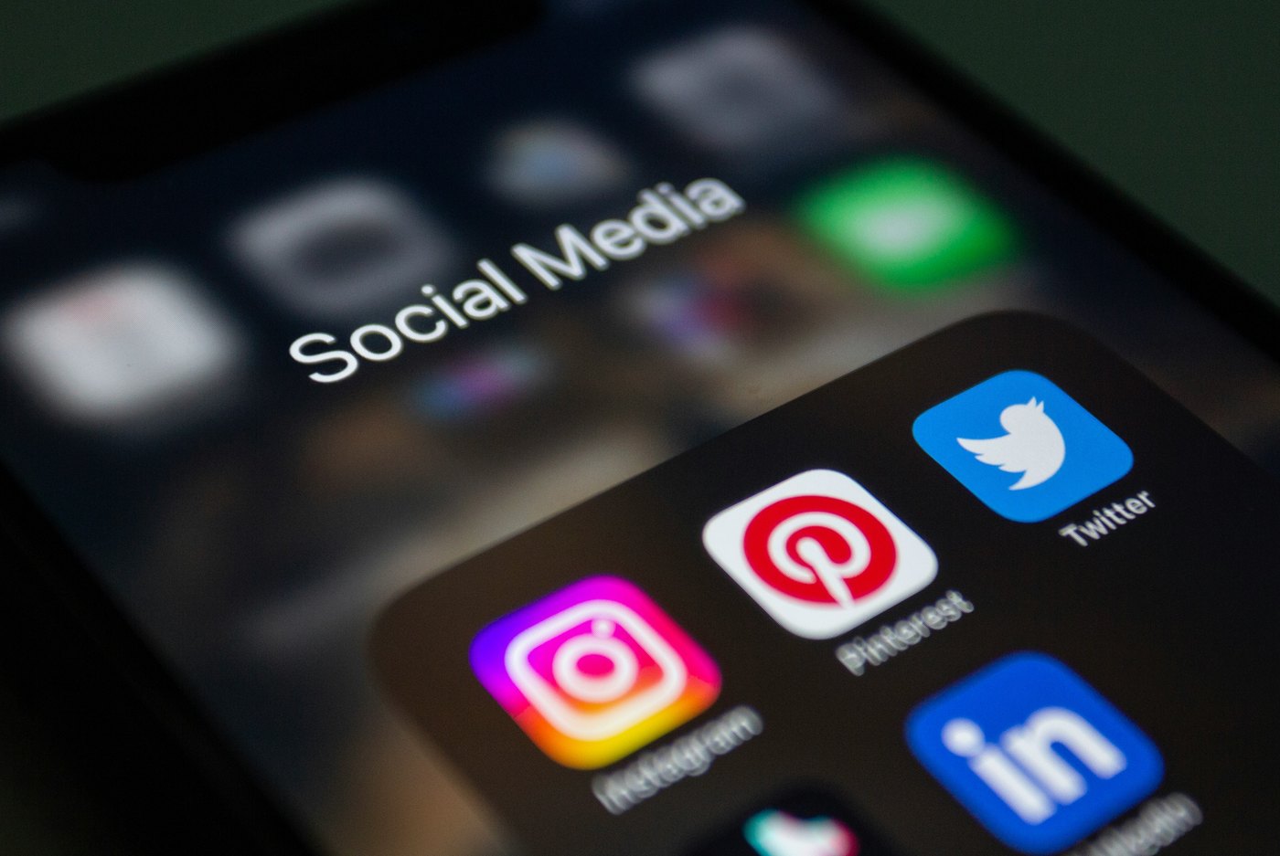 A phone screen showing a folder of social media apps