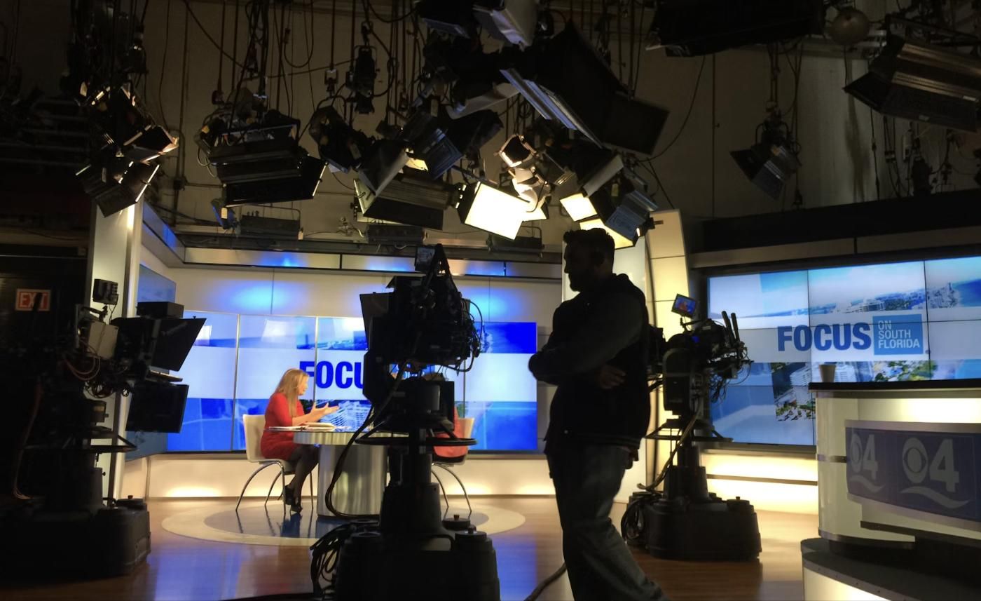 A television studio floor with cameras and lights
